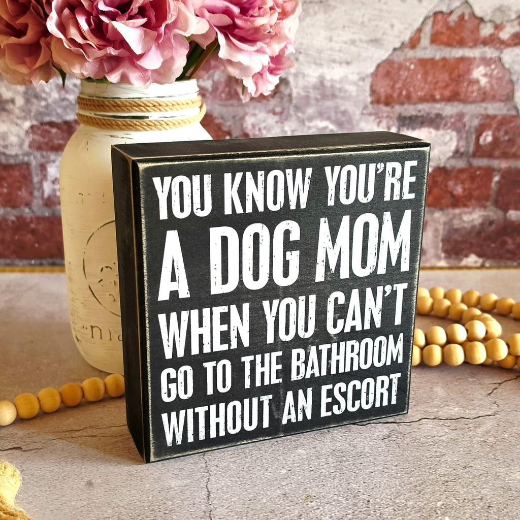 With an Escort Box Sign | Dog Mom