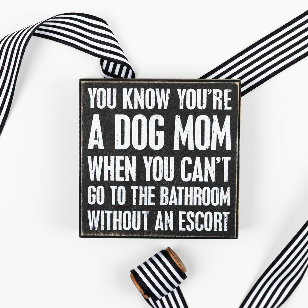 With an Escort Box Sign | Dog Mom