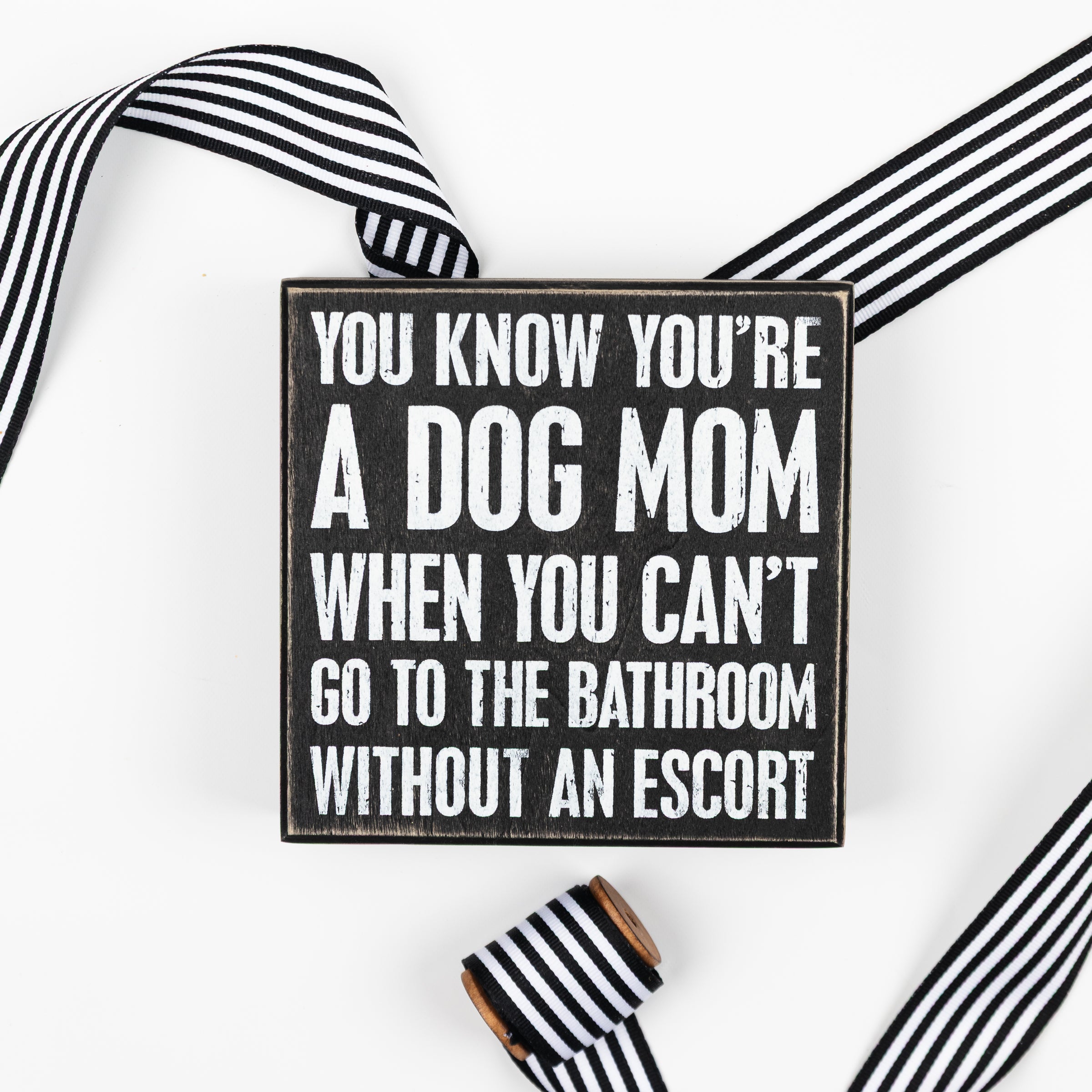 With an Escort Box Sign | Dog Mom